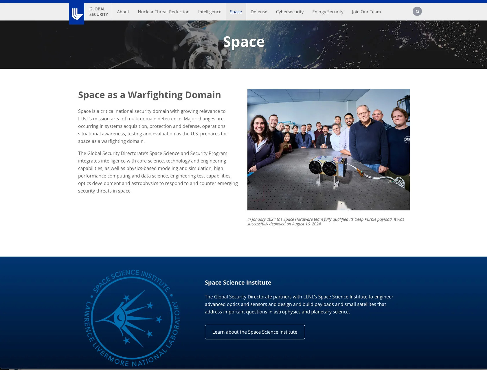 The Space program page, pairing an overview of space as a national security domain with a captioned photo of the Space Hardware team and its payload